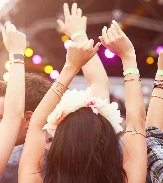 A group of people with their hands up